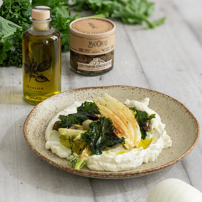 Fennel with whipped ricotta, pitted Peranzana olives, and kale chips